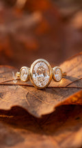 4.08 Carat Oval Lab Grown Diamond Engagement Ring, Bezel Set Trilogy 14k Gold